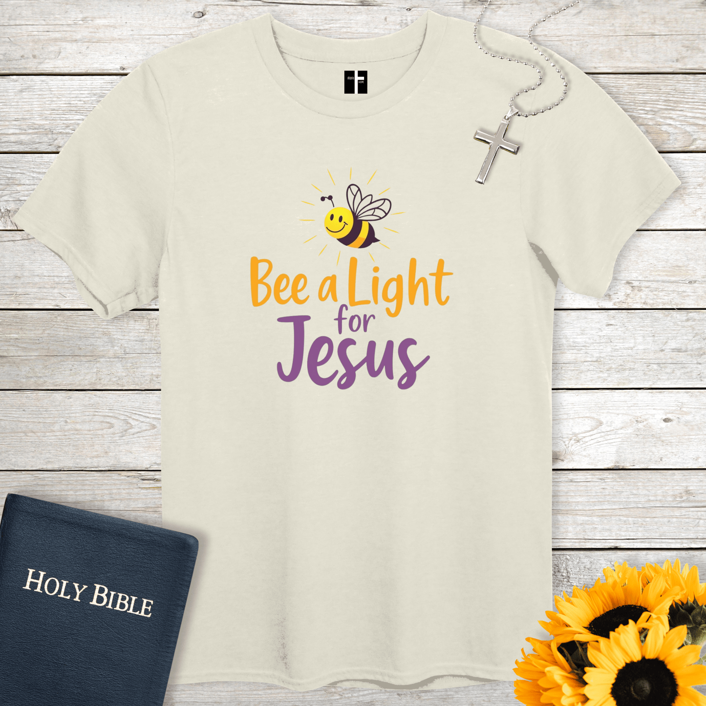 T-Shirt Natural / S Bee A Light Unisex Christian T-Shirt